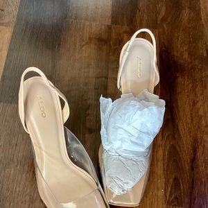 Clear stiletto beige shoes